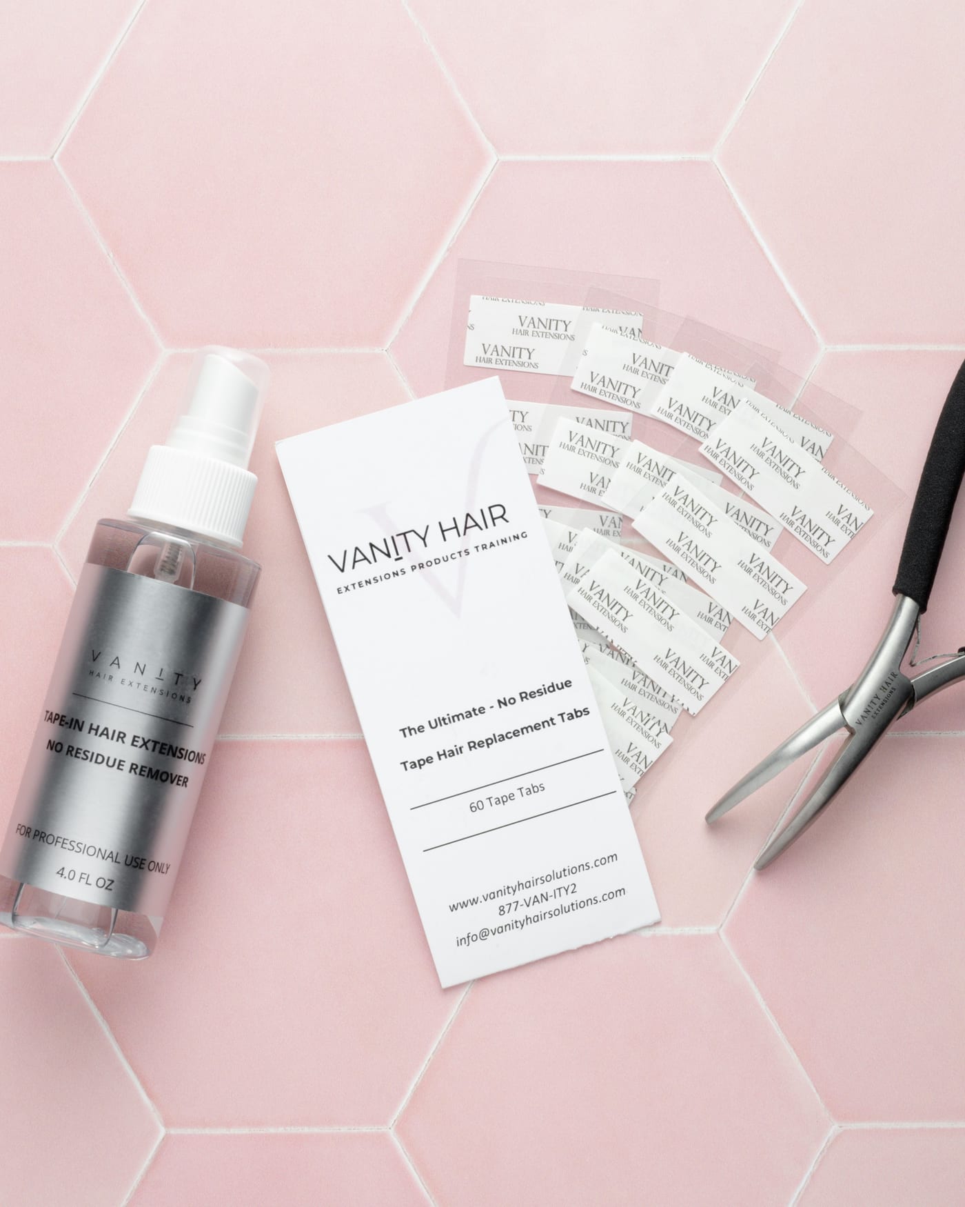 Vanity Hair Solutions kit components — remover, tabs, pliers